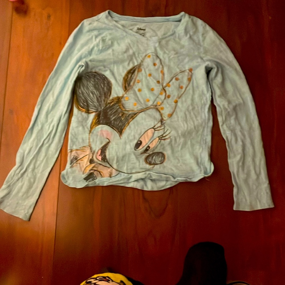 Blue, has Minnie Mouse, long sleeves, longer in the front, shorter on the back,